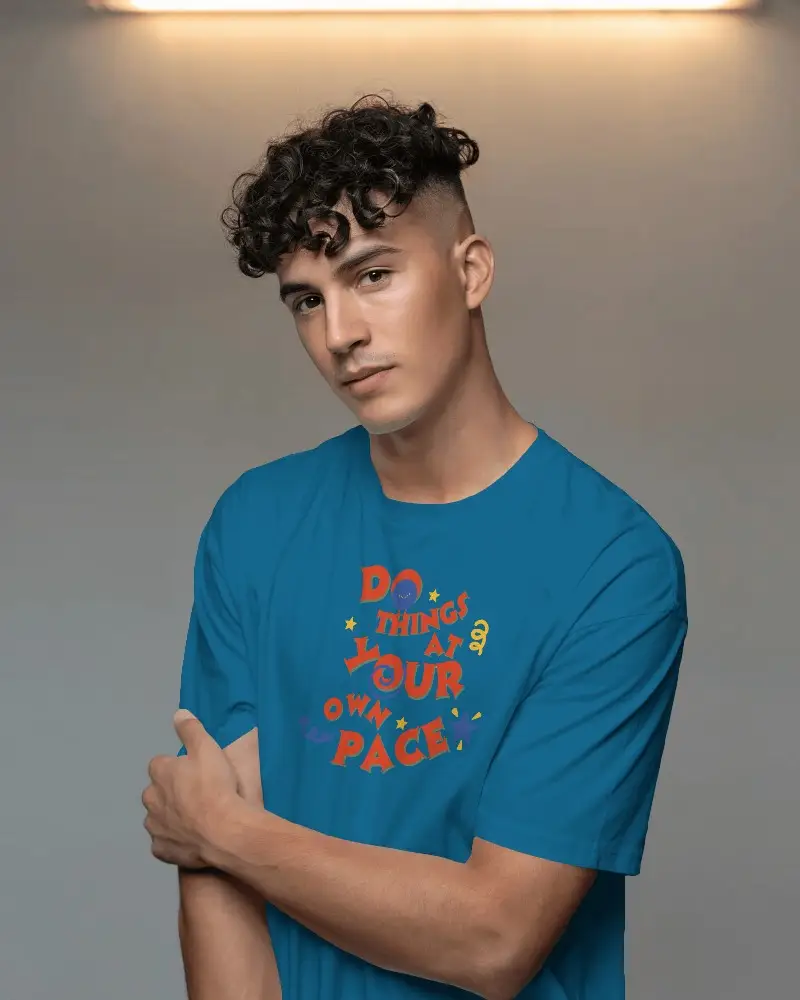 Modern Male T Shirt Mockup With Graphic Design Space On Model In Soft Lighting