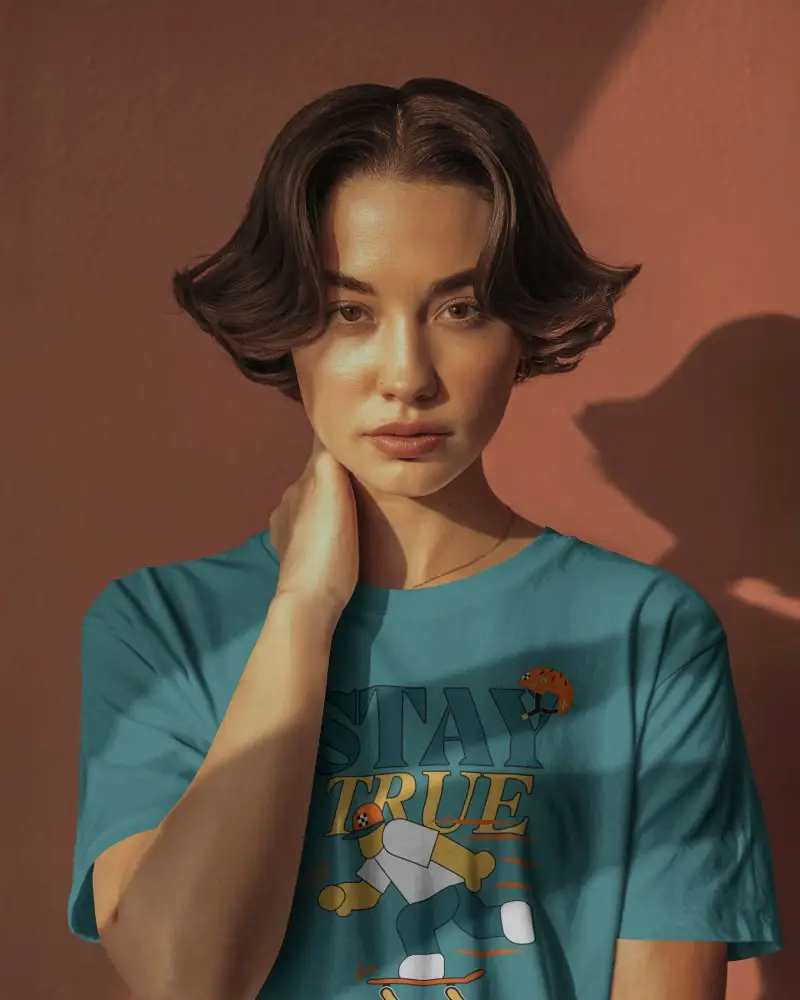 Natural Light Tshirt Mockup Woman Standing Against Earthy Orange Wall In Casual Pose