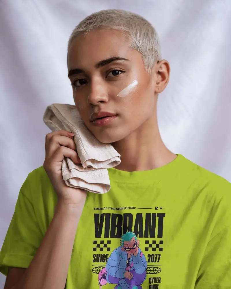 Beauty And Fashion T Shirt Mockup Female Model With Moisturizer Patch And Towel Under Gentle Shadows