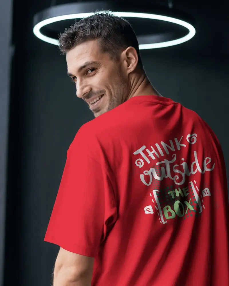 Stylish Back Print T Shirt Mockup With Man In Turned Pose Beneath Contemporary Lighting For Urban Fashion Branding