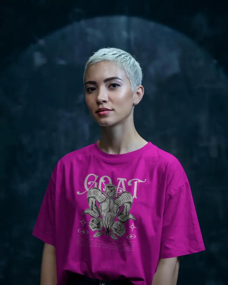 Studio Lit Fashion Forward T Shirt Mockup Female Model With Platinum Hair In Front Of Textured Dark Backdrop Confident And Modern Aesthetic