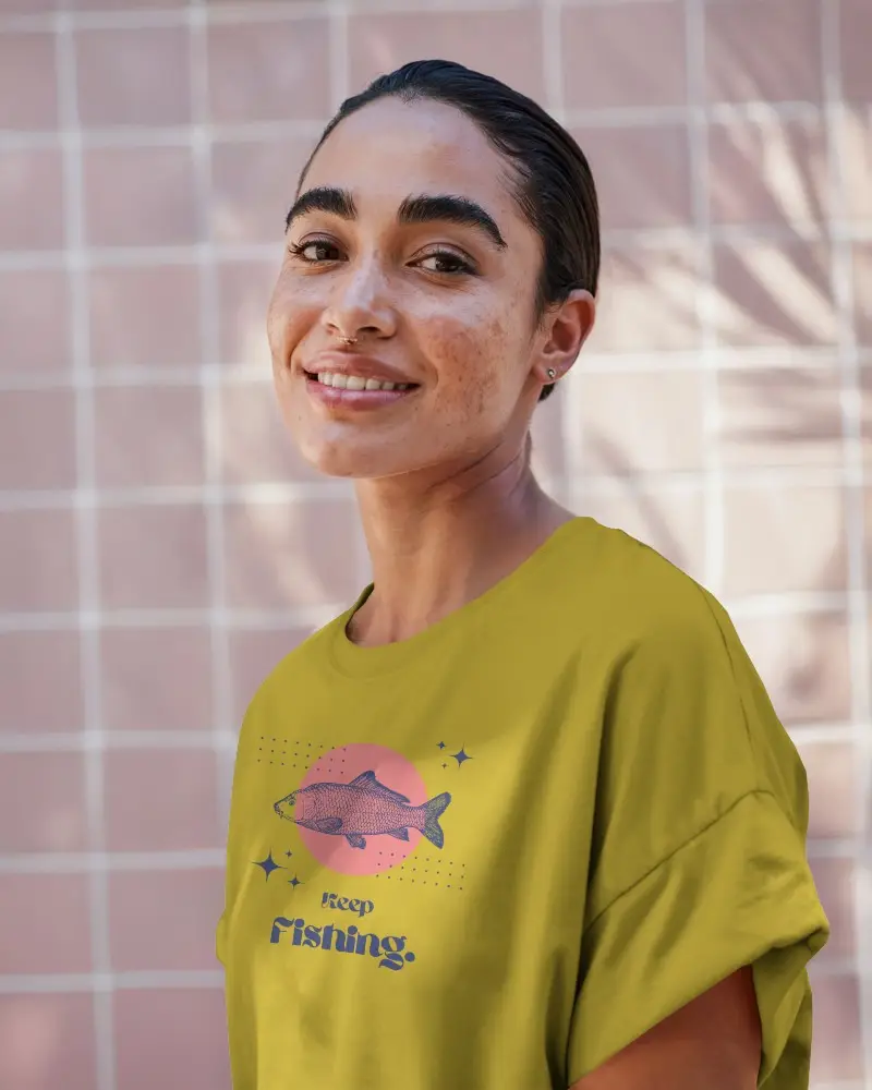 Tshirt Mockup Sunlit Tilewall Female Model Smiling In Soft Natural Light Urban Outdoor Vibe