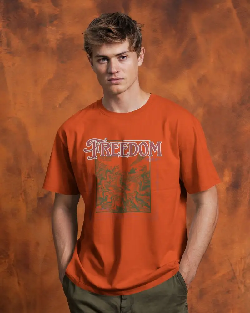 Tshirt Mockup Male Model Front View Hands In Pockets Against Textured Orange Backdrop Confident And Casual Pose