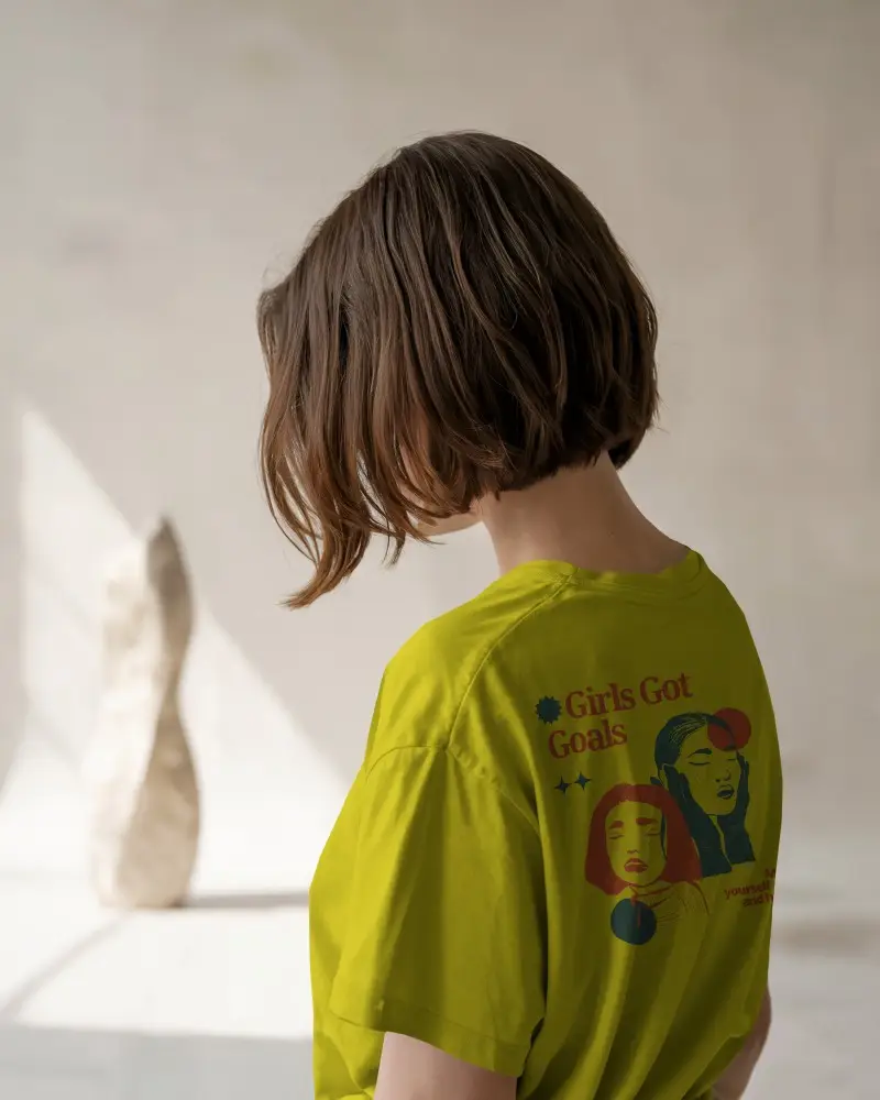 Tshirt Mockup Female Model Back View Soft Sunlit Minimalist Interior Calm And Artistic Atmosphere