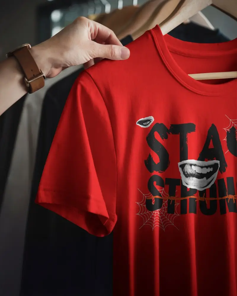 Minimal Wardrobe Tshirt Mockup Hand Picking White Tee From Clothing Rack Soft Lighting And Selective Focus