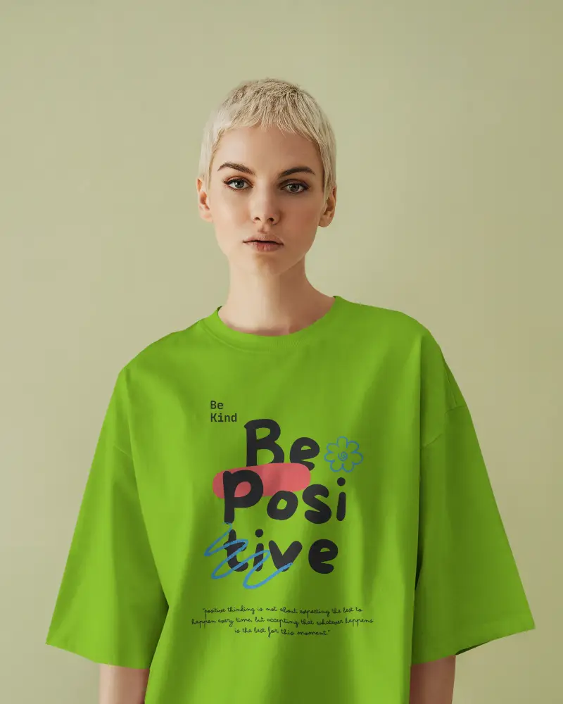 Studio Tshirt Mockup Woman Short Blonde Hair Facing Camera Soft Light Green Backdrop Clean Look