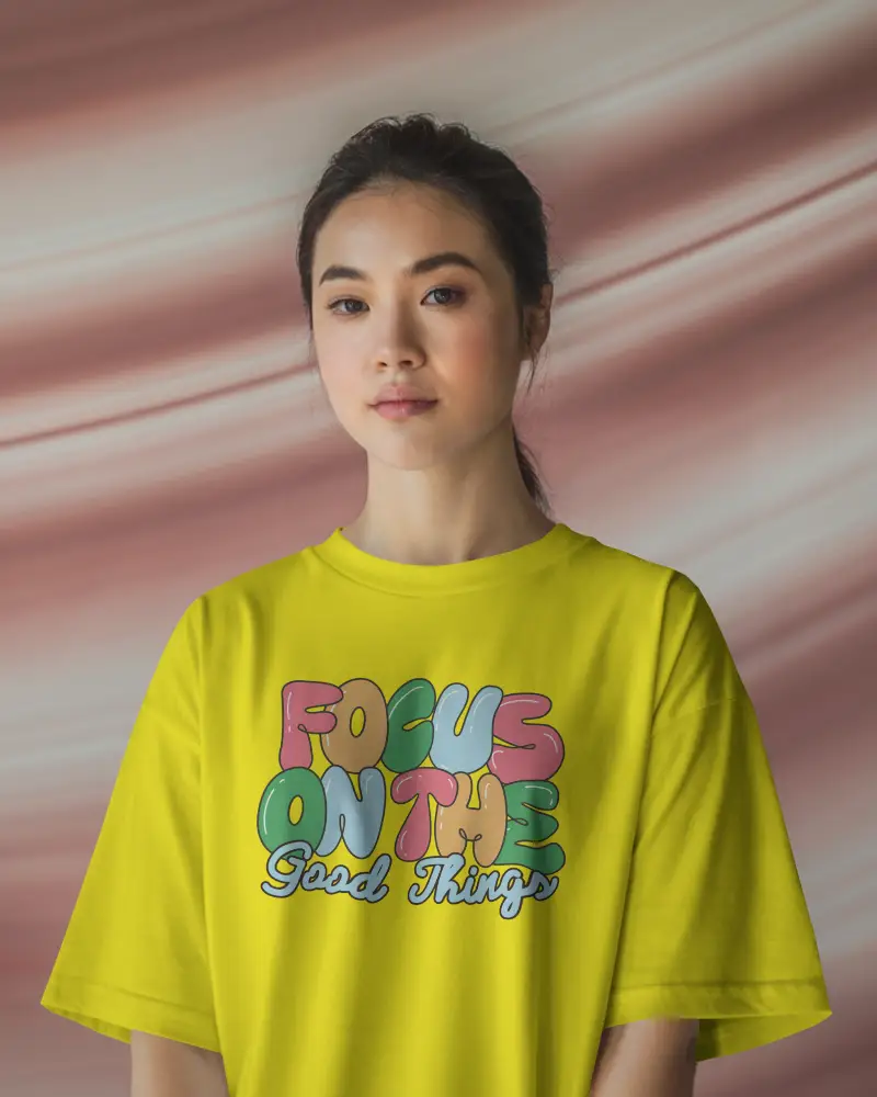 Studio Tshirt Mockup Woman In White Tee With Soft Focus Pink Swirled Backdrop Calm Expression