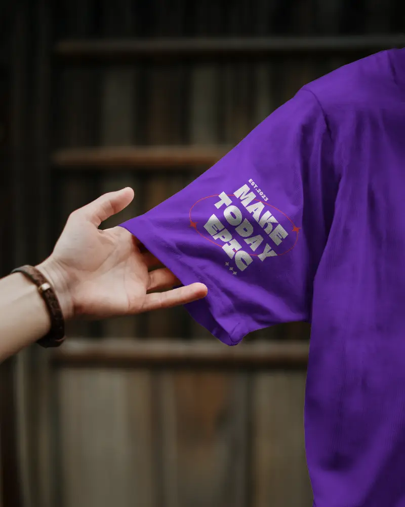 Closeup Tshirt Mockup Hand Pulling Shirt Sleeve Wooden Background Natural Light Focus Sleeve Print