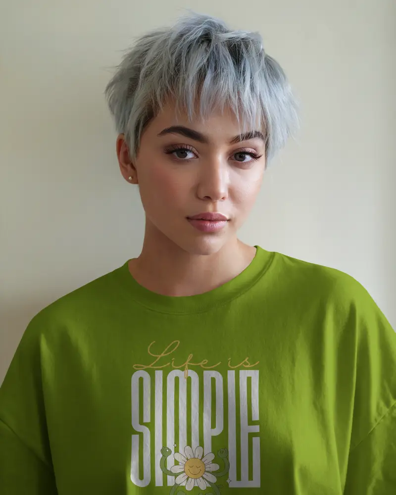 Studio Tshirt Mockup Woman With Silver Pixie Cut Wearing White Tee Soft Cream Wall Background