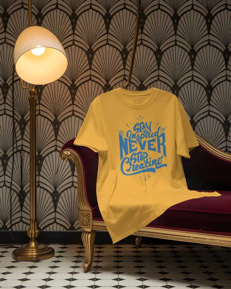 Vintage Lounge T Shirt Mockup Draped On Red Velvet Sofa Under Golden Lamp With Art Deco Wallpaper
