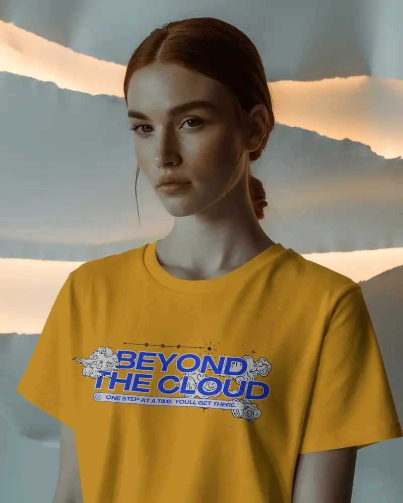 Minimalist Fashion T Shirt Mockup Woman In Natural Pose Against Glowing Wall Texture And Muted Tones