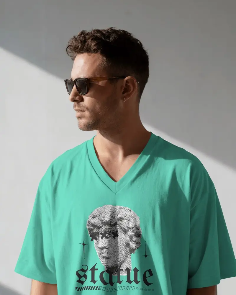 Modern V Neck T Shirt Mockup Male Model In Sunglasses Under Natural Light And Soft Shadows