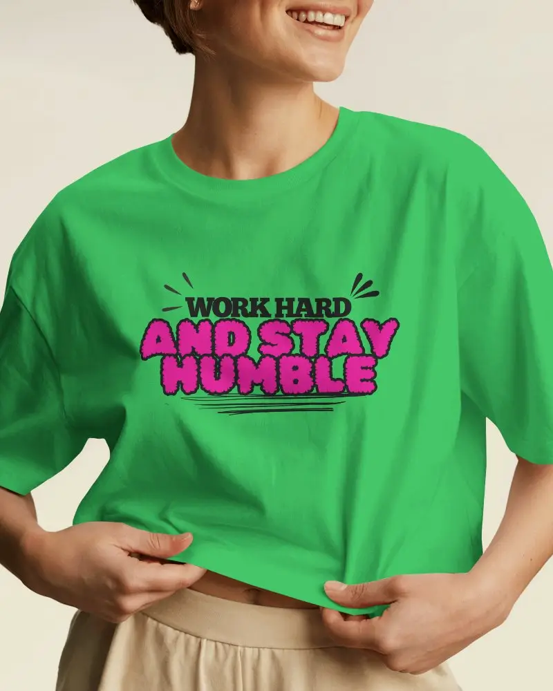 Cropped Studio T Shirt Mockup Woman Smiling And Holding T Shirt In Bright Neutral Light