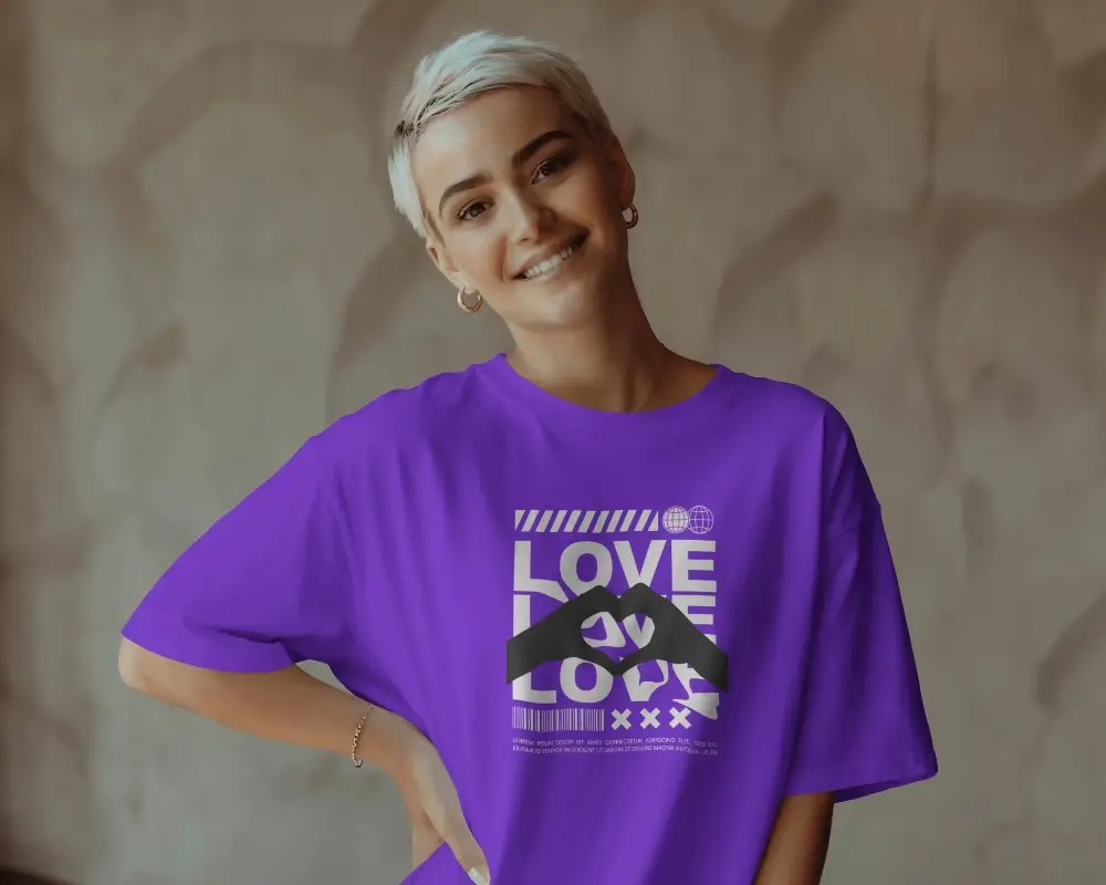 Smiling Female Model Wearing Relaxed T Shirt Mockup With Short Hair And Soft Background Light