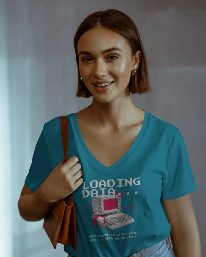 Casual V Neck T Shirt Mockup Female Model Smiling In Soft Light With Leather Shoulder Bag