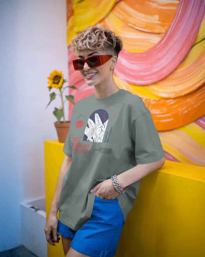 Vibrant Streetwear T Shirt Display On Trendy Woman With Curly Hair And Colorful Wall Art