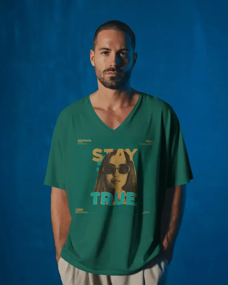 Minimalist V Neck T Shirt Mockup Man Standing Casually In Dark Blue Backdrop