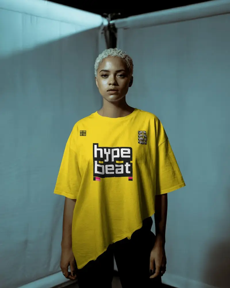 Moody Studio T Shirt Mockup Female Model Front Facing In Soft Blue Toned Lighting