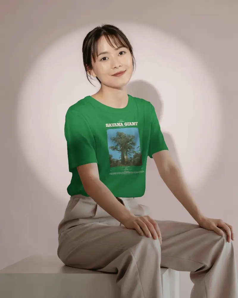 Casual Seated Female Model Tshirt Mockup Soft Pink Background With Spotlight Studio Lighting