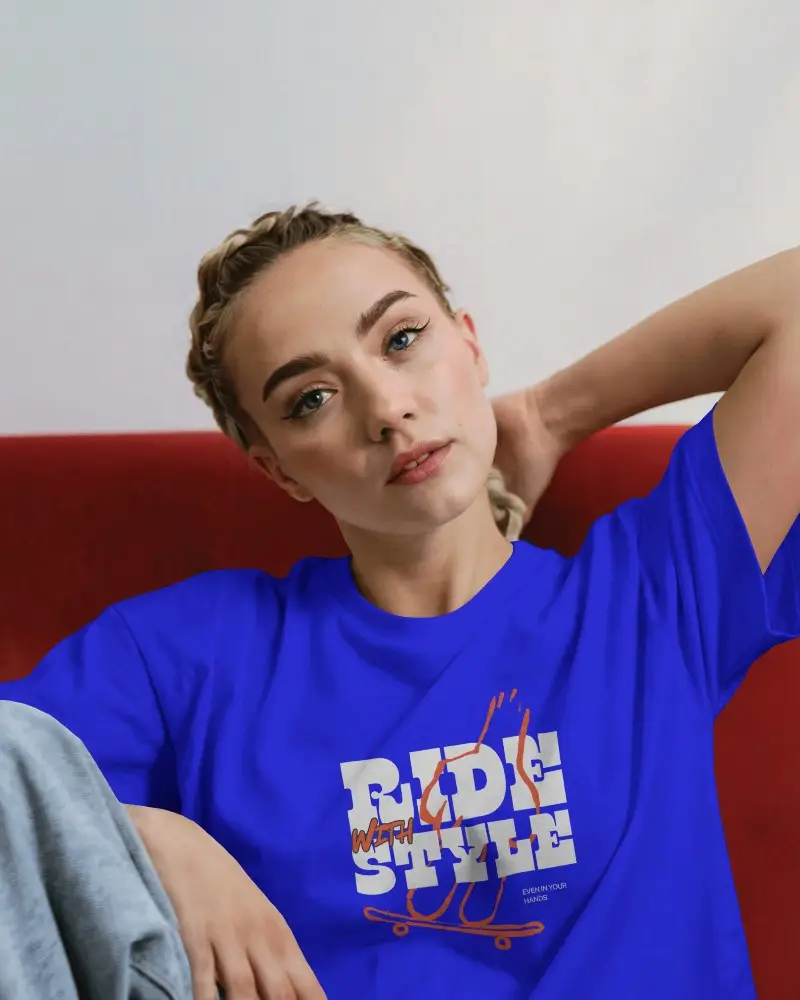 Relaxed Pose T Shirt Mockup Female Model Red Chair Light Blue Denim Modern Streetwear