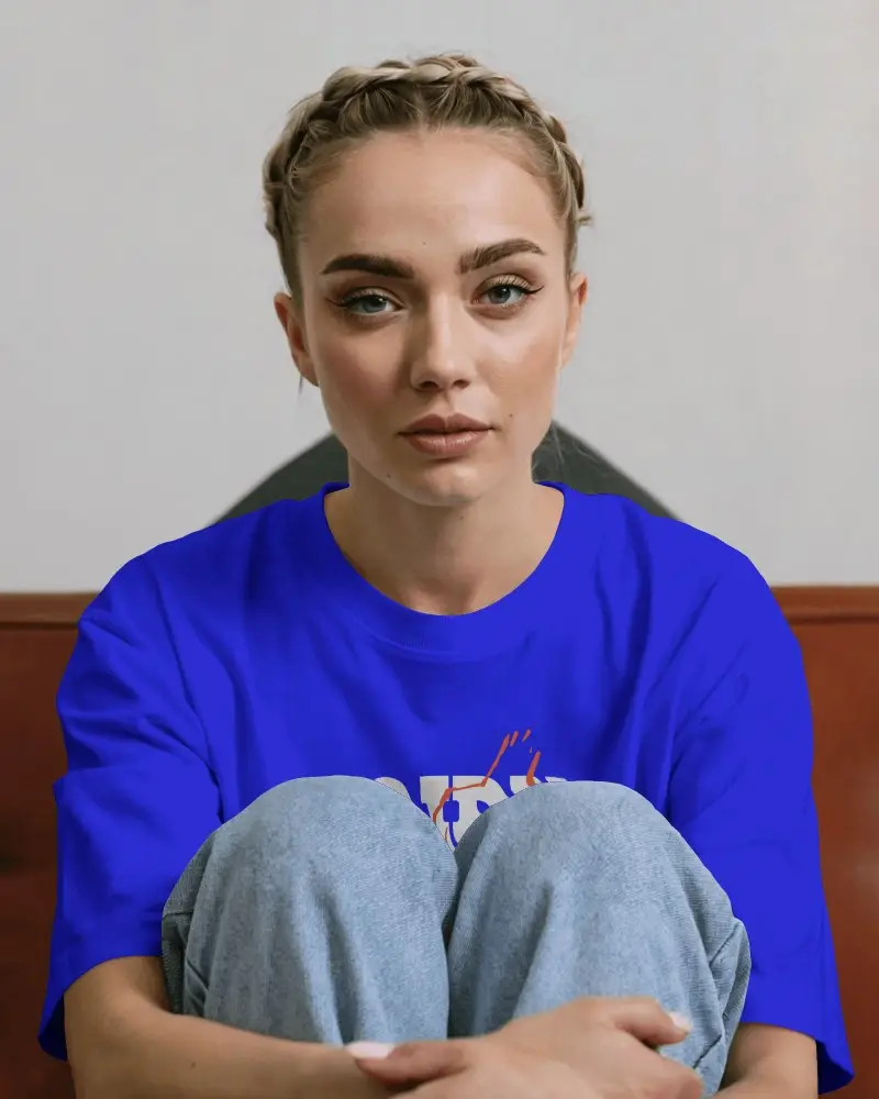 Seated Cozy T Shirt Mockup Female Model Knees Up Casual Denim Streetwear Soft Expression