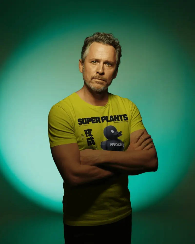 Confident Male T Shirt Mockup Mature Man Posing With Crossed Arms In Studio Colored Light