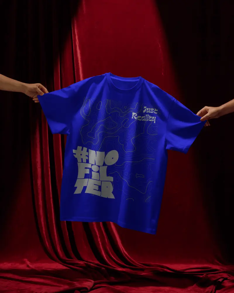 Dramatic Hand Holding T Shirt Mockup Floating Display With Red Velvet Curtains And Moody Light