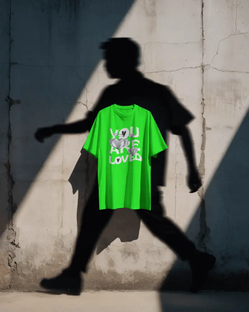 Creative Shadow Tshirt Mockup Floating Tee Against Concrete Wall With Human Silhouette