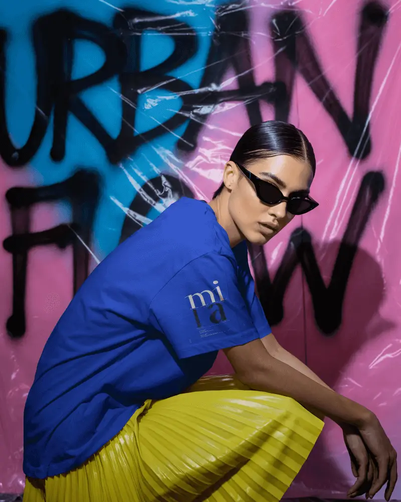 Streetwear Tshirt Mockup Female Model In Yellow Skirt With Urban Graffiti Background
