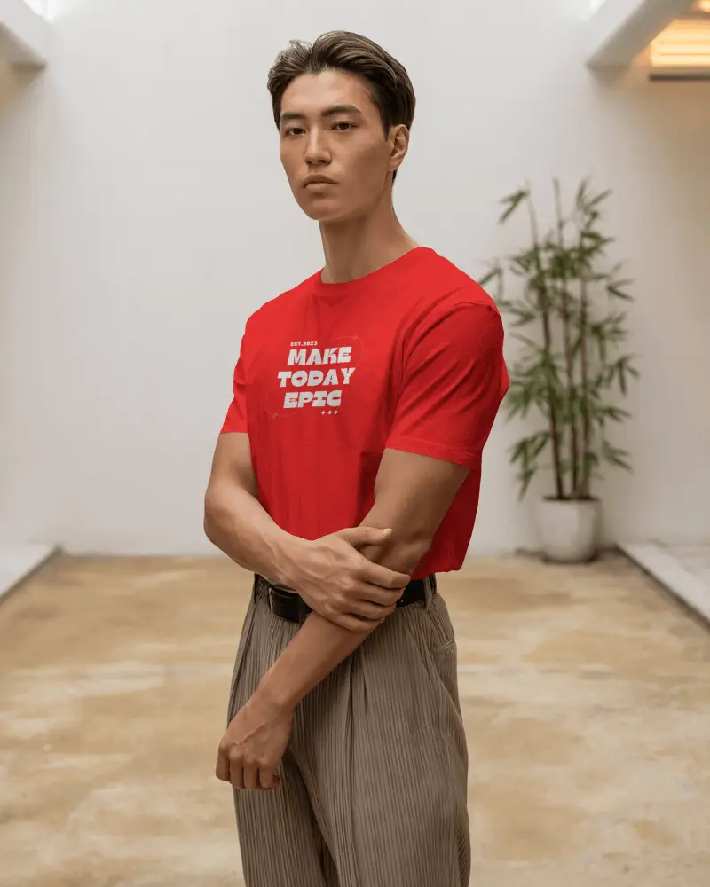Minimalist Studio Tshirt Mockup Male Model Standing In Bright Interior With Bamboo Plant