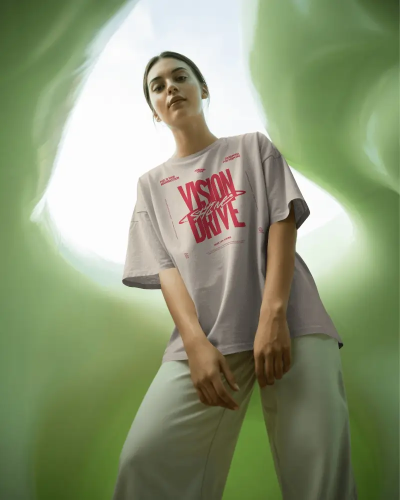 Minimal Studio T Shirt Mockup Female Model Looking Up In Soft Green Light Modern Style