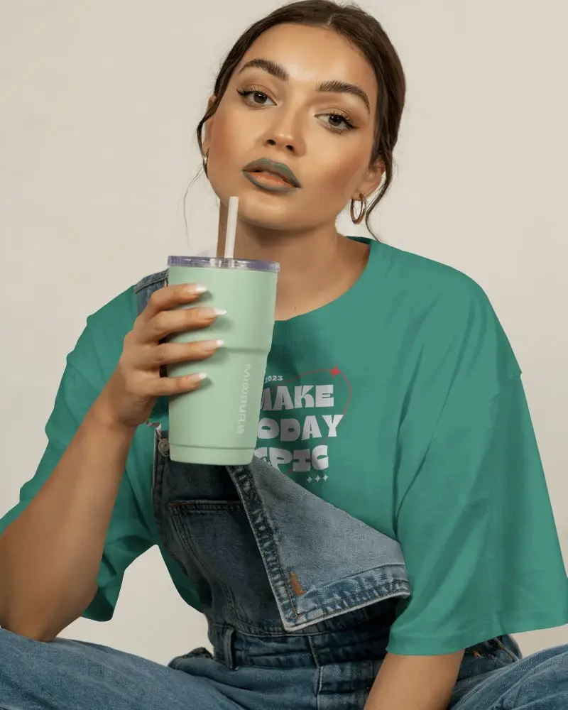 Casual Loose Fit Tshirt Mockup Women Posing With Drink Fashionable Street Style Urban