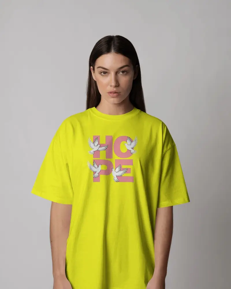 Front Facing T Shirt Mockup Female Model In Clean Neutral Studio Lighting