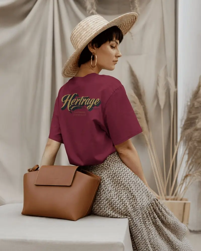Lifestyle Fashion T Shirt Mockup On Female Model Back View In Artistic Studio Setting