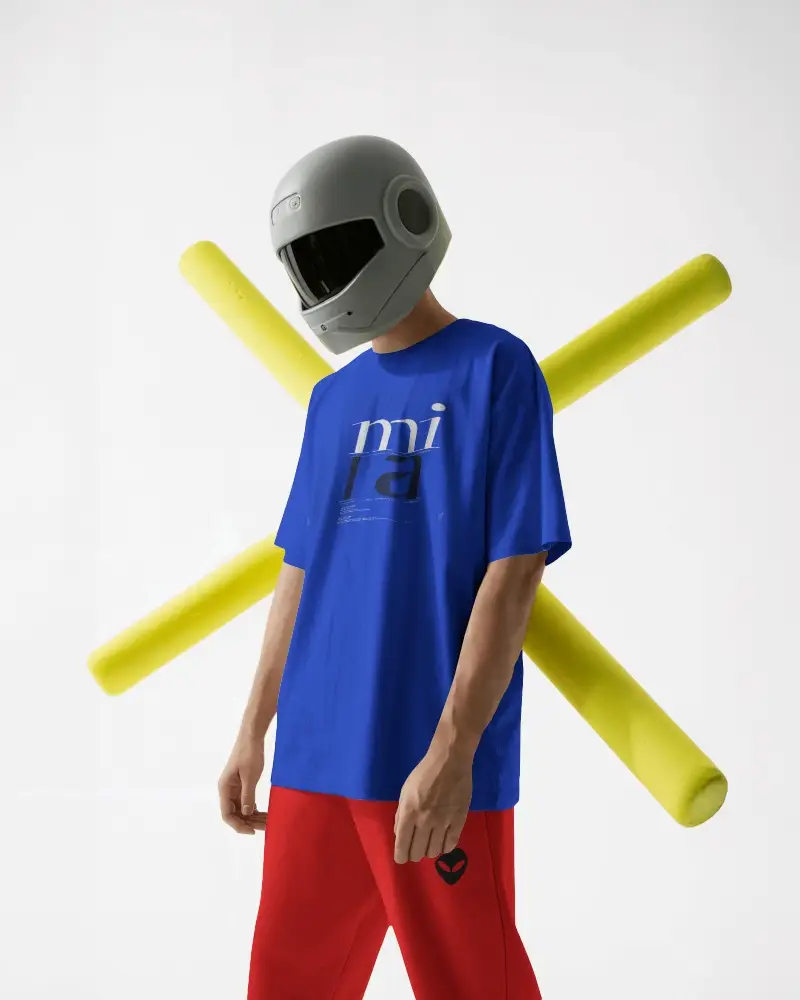 Futuristic Studio T Shirt Mockup Male Model Wearing Plain Tee With Helmet Minimal White Background
