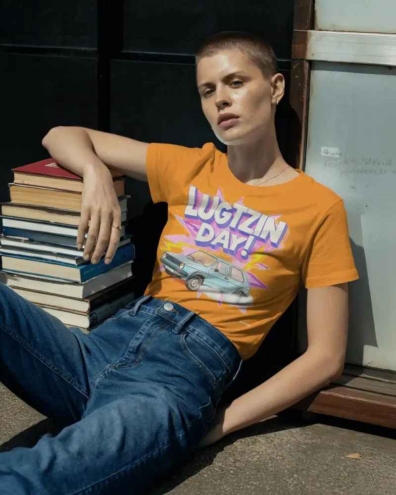 Tshirt Mockup Female Model Relaxed On Floor With Books Casual Lifestyle Fashion Scene