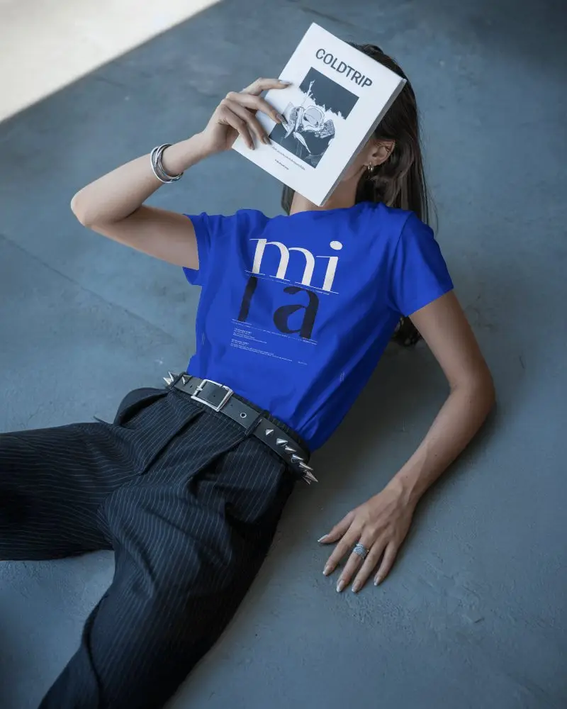 Tshirt Mockup Female Model Lying Down Covering Face With Magazine Editorial Style