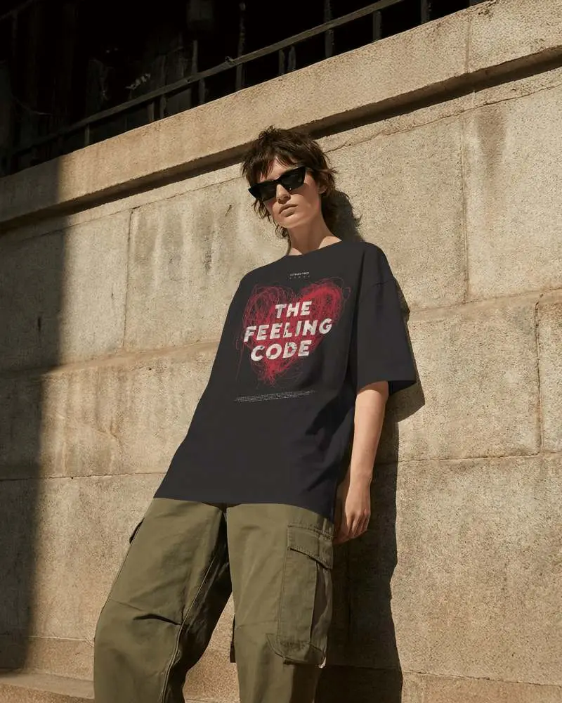 Urban Street T Shirt Mockup Female Model Leaning Against Stone Wall Concrete