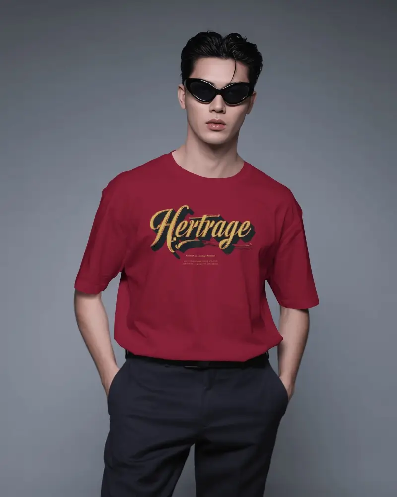 Modern Front Facing T Shirt Mockup With Model Standing Relaxed In Studio Grey Gradient Backdrop