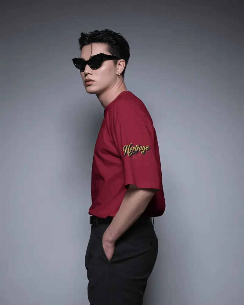 Side Profile T Shirt Mockup With Model Facing Left In Studio Setting