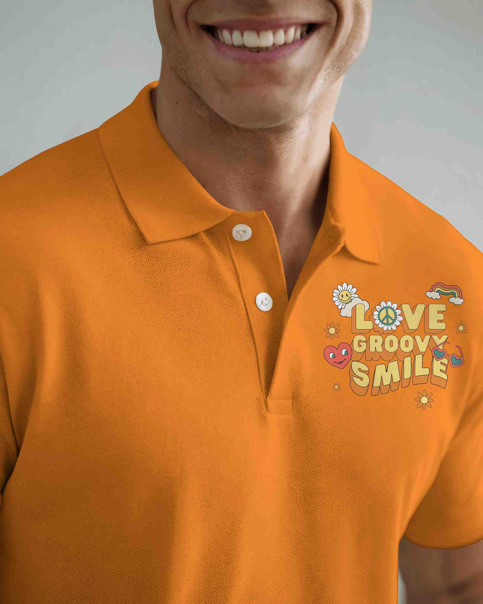 Casual Polo Shirt Mockup Smiling Male Model In Bright Orange Polo With Embroidered Design Against Neutral Background Modern And Stylish Look
