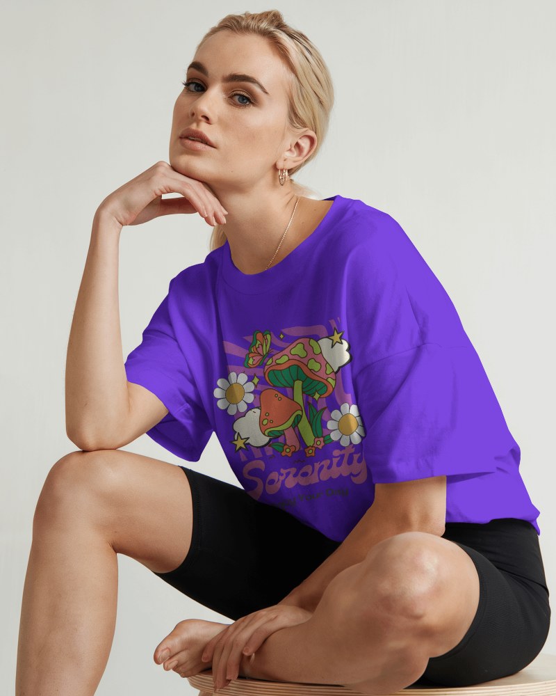 Studio Lighting T Shirt Mockup Blonde Female Model In White Oversized Tee And Black Shorts Modern And Chic 0584