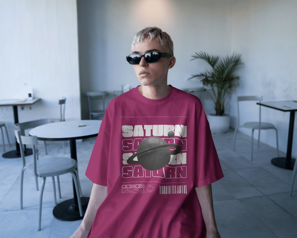 Modern Cafe T Shirt Mockup Male Model In Oversized Fit Wearing Sunglasses Minimalist Interior With Natural Lighting Cool And Trendy Aesthetic 0637