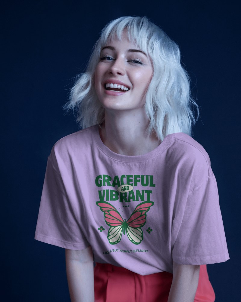 Playful Contrast T Shirt Mockup Female Model Smiling Against Deep Blue Background Modern Bold Style 0676