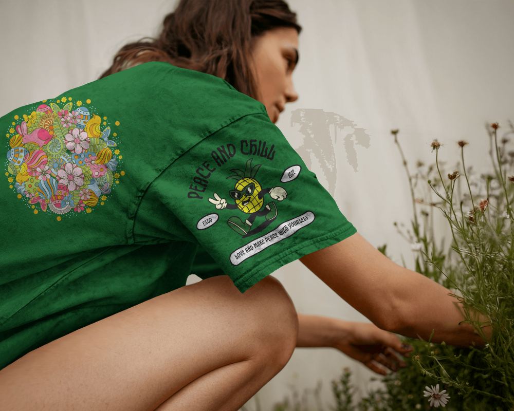 Acid Wash Outdoor Garden T Shirt Mockup Female Model Kneeling Among Wildflowers In Natural Daylight Soft And Earthy Aesthetic 0770