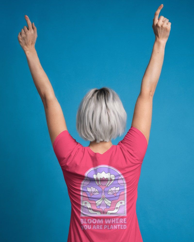 Studio Backdrop Back View Blank White Tshirt Mockup Happy Short Haired Female Model Raising Arms Against Bold Blue Background Energetic And Clean Style 0889