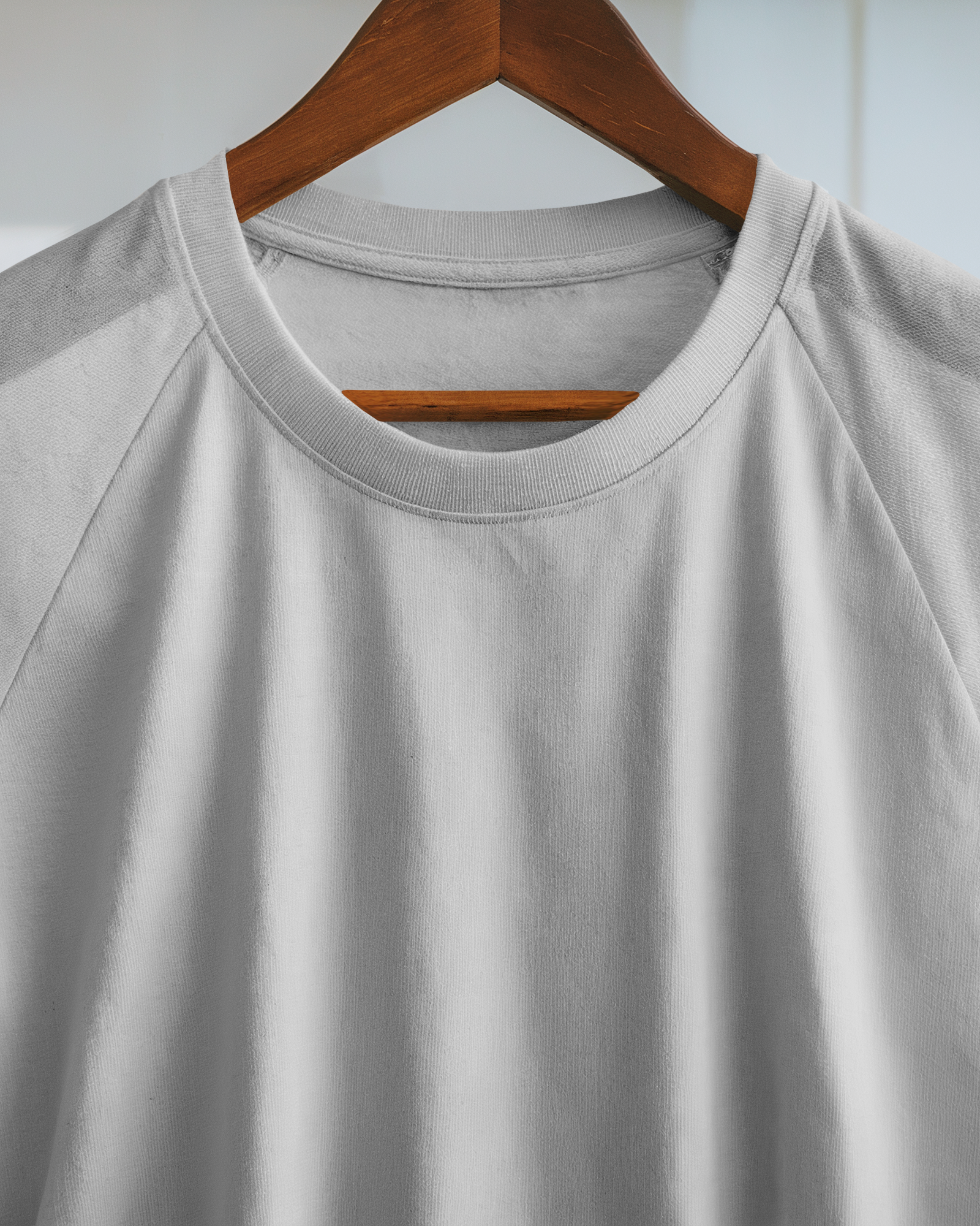 Minimal Hanger T Shirt Mockup Close Up Front View On Wooden Hanger Soft Natural Lighting Close Upclean And Neutral Display 0919