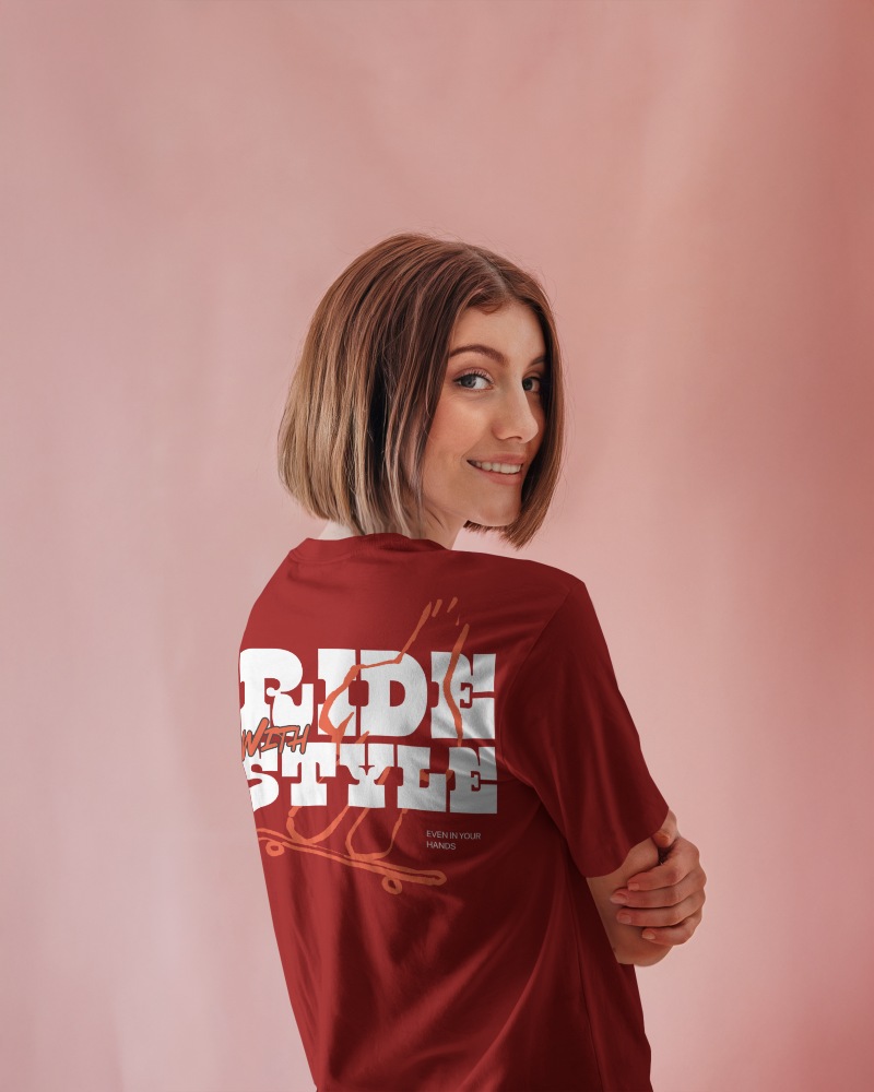 Soft Pink Backview Tshirt Mockup Female Model Smiling Over Shoulder Minimal Pastel Background Light And Cheerful Aesthetic 0927