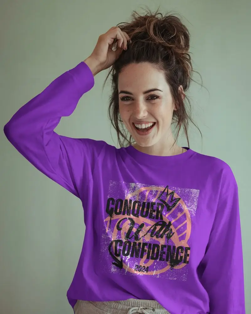 Casual Long Sleeve T Shirt Mockup Smiling Female Model Touching Hair Soft Natural Light On Muted Green Backdrop