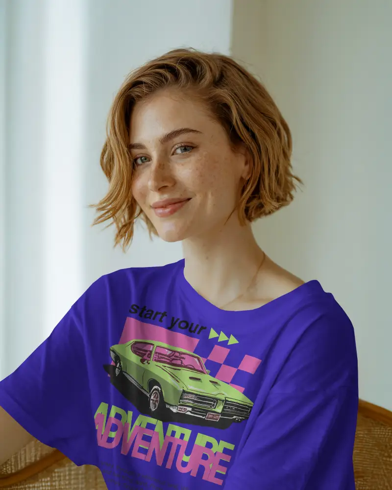 Natural Light Tshirt Mockup Woman Smiling In White Tee Sitting On Chair Soft Indoor Ambience